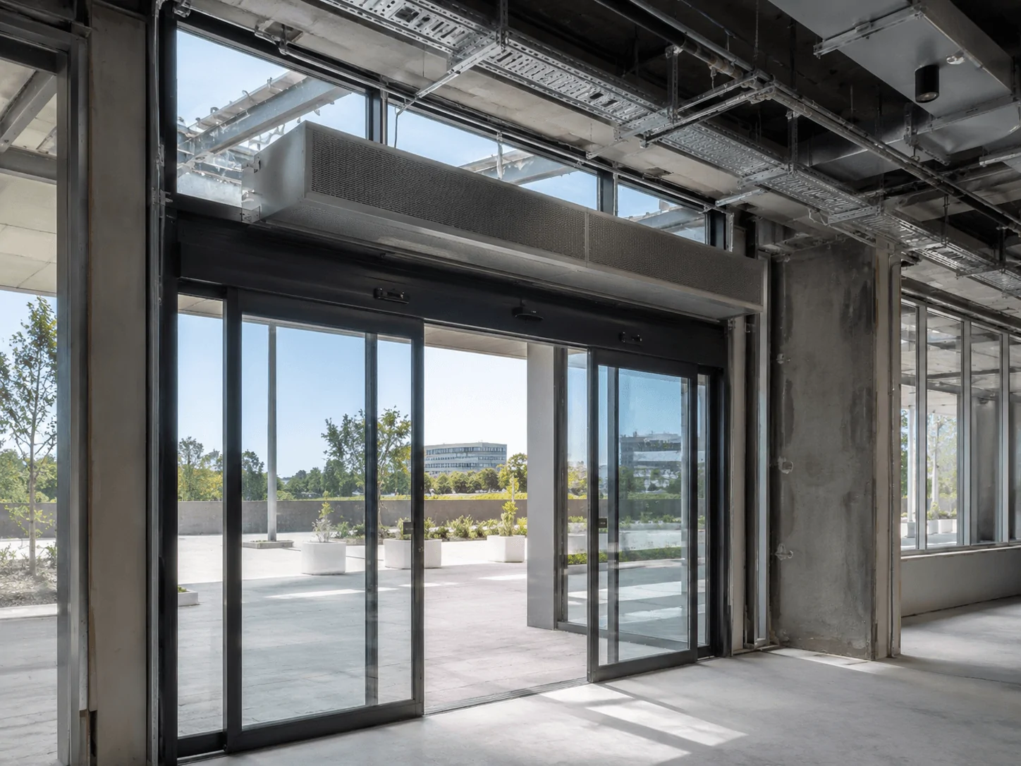 Automatic Sliding Door HVAC Integration: Coordinating Doors with Overhead Air Curtains